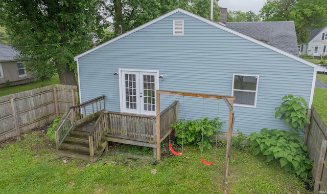 1109 E 6th St, Fowler, IN 47944 - back of property featuring french doors, a wooden deck, and a chimney