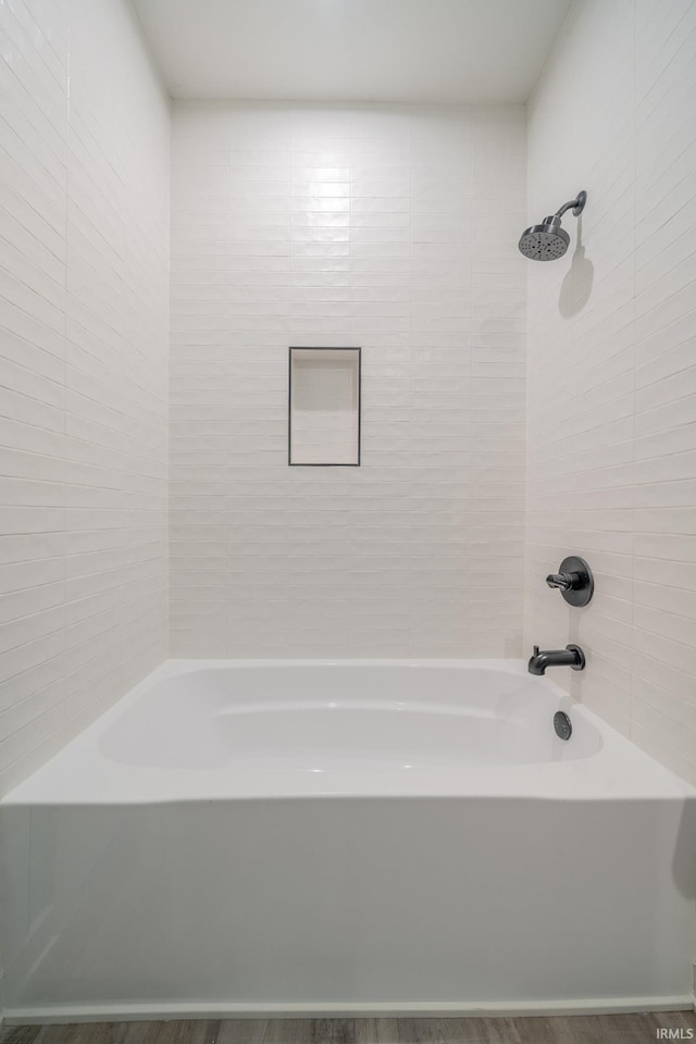 848 W S St, Upland, IN 46989 - full bathroom with tile walls and washtub / shower combination