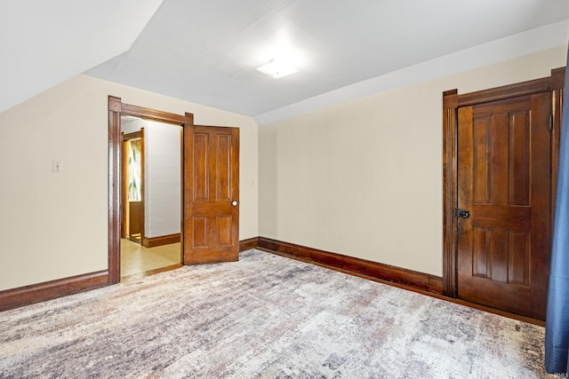 1202 S Van Buren St, Auburn, IN 46706 - unfurnished room featuring lofted ceiling and baseboards