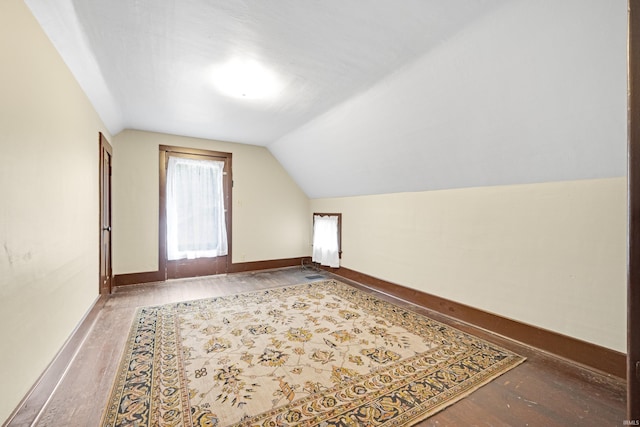 1202 S Van Buren St, Auburn, IN 46706 - bonus room featuring vaulted ceiling, wood finished floors, and baseboards