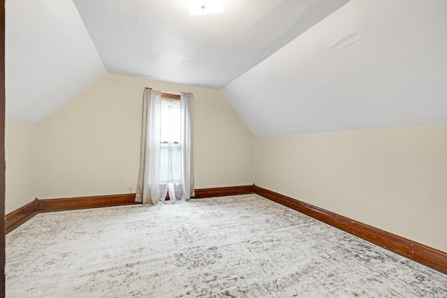 1202 S Van Buren St, Auburn, IN 46706 - additional living space with baseboards and vaulted ceiling