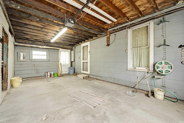 1202 S Van Buren St, Auburn, IN 46706 - garage with a garage door opener and concrete block wall