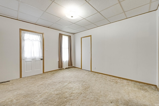 1202 S Van Buren St, Auburn, IN 46706 - empty room with a paneled ceiling and carpet