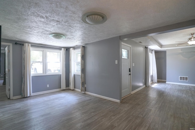 52589 Lilac Rd, South Bend, IN 46628 - unfurnished room with wood finished floors, baseboards, a textured ceiling, and ceiling fan