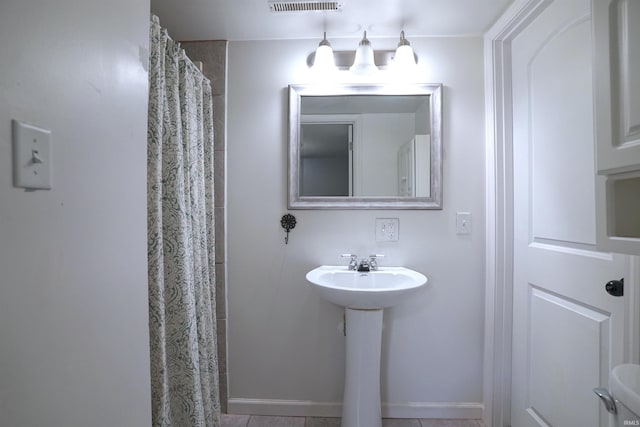 52589 Lilac Rd, South Bend, IN 46628 - bathroom with baseboards