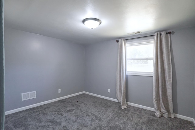 52589 Lilac Rd, South Bend, IN 46628 - carpeted empty room with baseboards