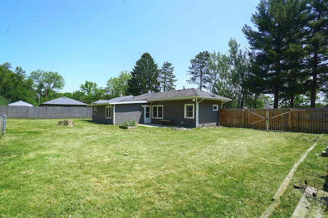 52589 Lilac Rd, South Bend, IN 46628 - rear view of property with a patio