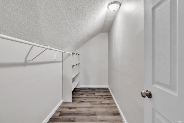 3709 Shady Ct, Fort Wayne, IN 46807 - spacious closet featuring wood finished floors and lofted ceiling