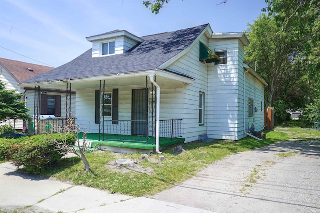 2117 Linden Ave, South Bend, IN 46628 - bungalow featuring a porch and roof with shingles