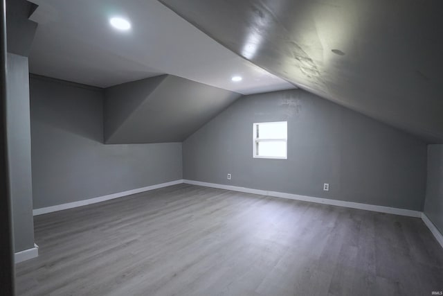2117 Linden Ave, South Bend, IN 46628 - bonus room featuring wood finished floors, baseboards, recessed lighting, and vaulted ceiling