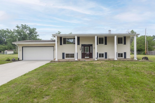 53140 Bowercrest Ct, South Bend, IN 46635 - raised ranch featuring an attached garage, driveway, and a front lawn