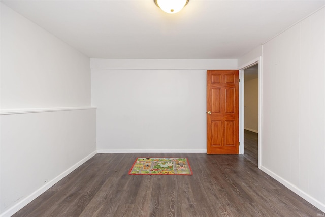 53140 Bowercrest Ct, South Bend, IN 46635 - spare room with dark wood-style floors and baseboards
