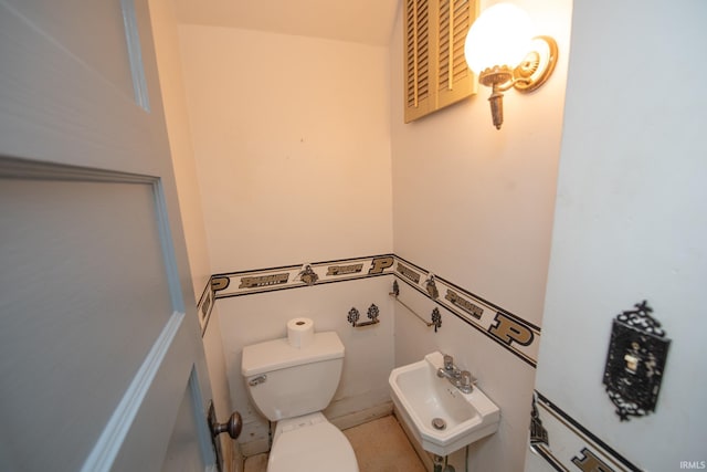 924 S Washington St, Delphi, IN 46923 - half bathroom with toilet and a sink