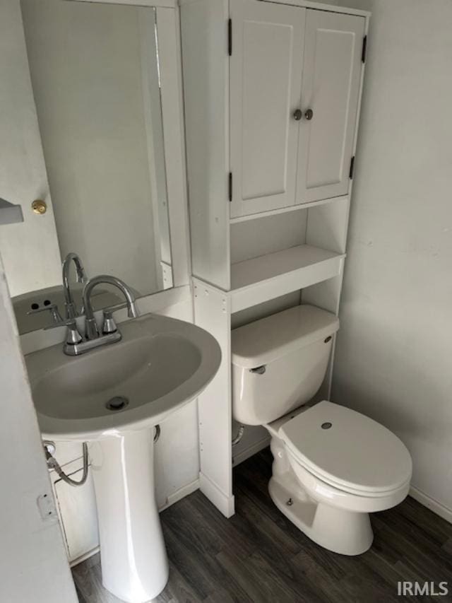 1413 Orkney Ct, South Bend, IN 46614 - half bathroom with wood finished floors