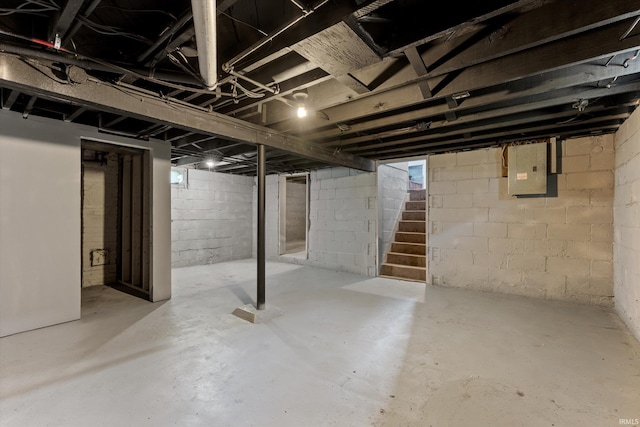 1815 E Bowman St, South Bend, IN 46613 - unfinished basement with electric panel and stairs