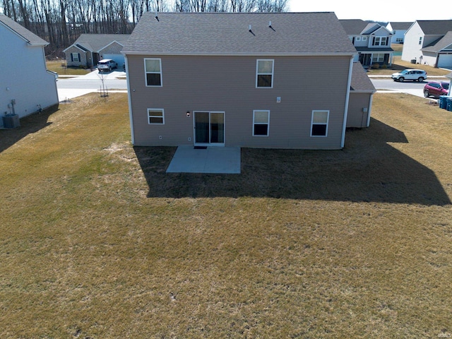 4632 Portney Pl, Fort Wayne, IN 46818 - back of house with a patio, a lawn, and central AC
