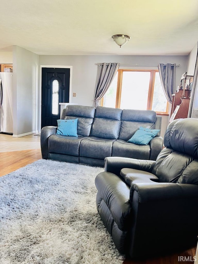 121 N Oakley Ave, Mishawaka, IN 46544 - living area with light wood finished floors and baseboards