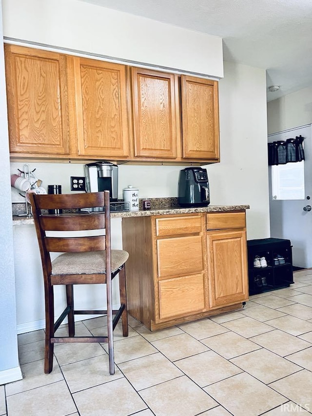 121 N Oakley Ave, Mishawaka, IN 46544 - kitchen featuring light tile patterned flooring