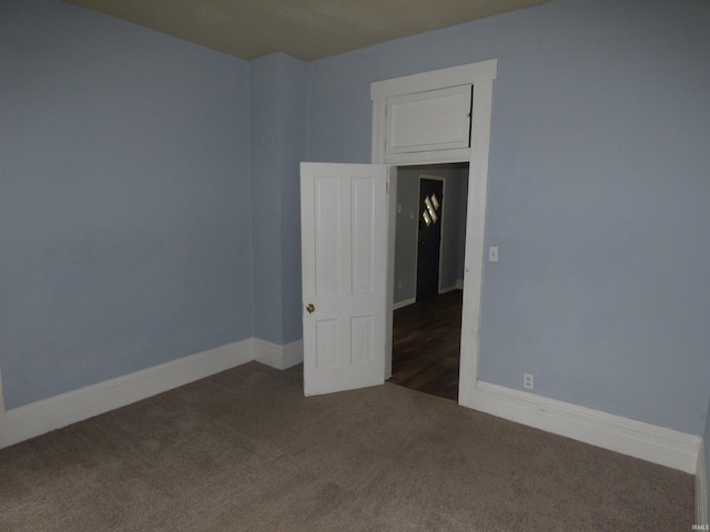 302 W Freeman St, Frankfort, IN 46041 - spare room with carpet floors and baseboards