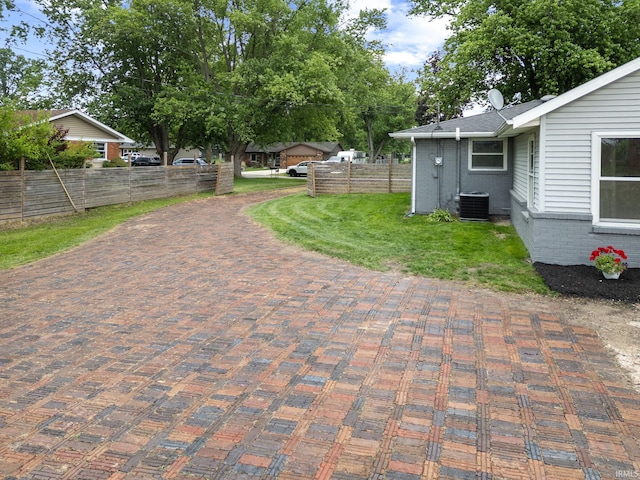 5012 Autumn Ln, Lafayette, IN 47909 - view of yard featuring central AC unit