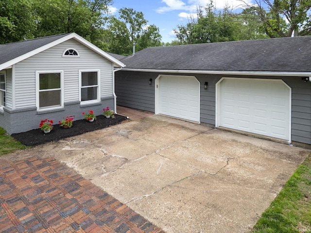 5012 Autumn Ln, Lafayette, IN 47909 - view of front of house with a shingled roof and driveway