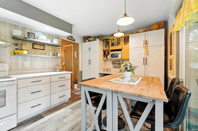 6916 Woodtrail Ct, Fort Wayne, IN 46835 - kitchen featuring white appliances, open shelves, light wood finished floors, and white cabinetry