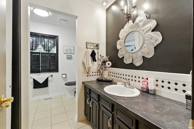 6916 Woodtrail Ct, Fort Wayne, IN 46835 - bathroom with ornamental molding, backsplash, vanity, toilet, and tile patterned flooring