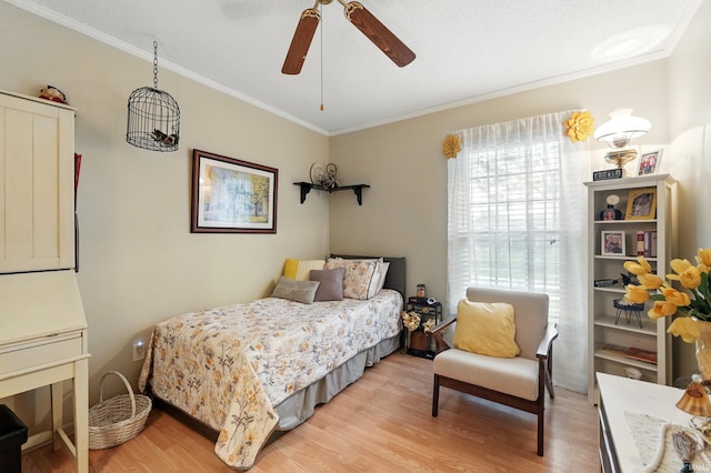 6916 Woodtrail Ct, Fort Wayne, IN 46835 - bedroom with light wood-style flooring, crown molding, and a ceiling fan