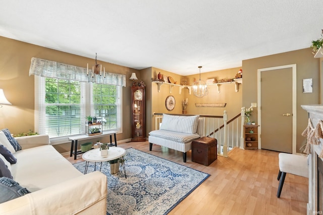 6916 Woodtrail Ct, Fort Wayne, IN 46835 - living area featuring a chandelier and wood finished floors
