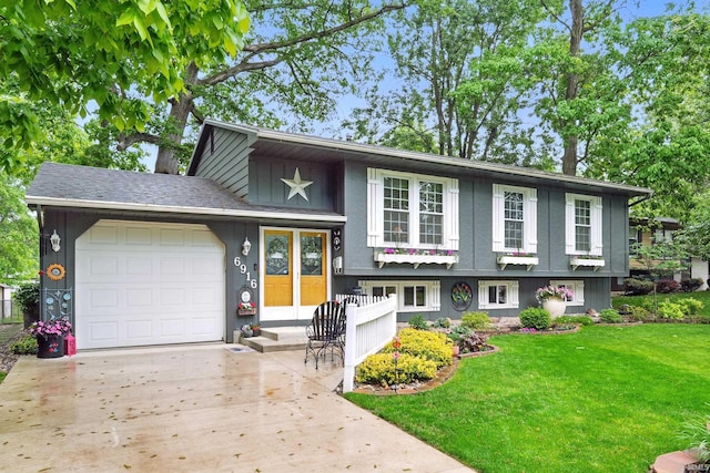 6916 Woodtrail Ct, Fort Wayne, IN 46835 - split level home featuring an attached garage, a front yard, and concrete driveway