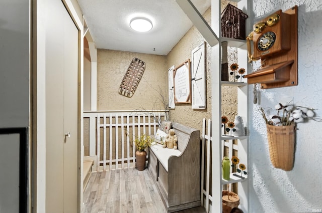 6916 Woodtrail Ct, Fort Wayne, IN 46835 - interior space with wood finished floors and a textured wall