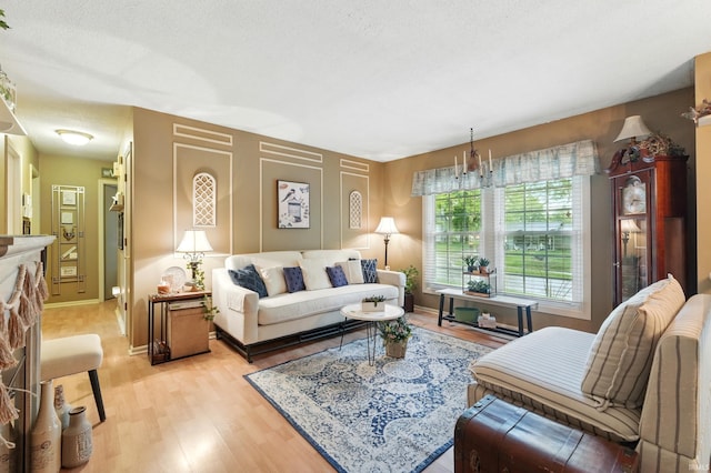 6916 Woodtrail Ct, Fort Wayne, IN 46835 - living room featuring light wood-type flooring and baseboards