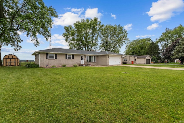 5345 E 00 Ns, Greentown, IN 46936 - ranch-style house featuring an attached garage, concrete driveway, a front yard, and brick siding