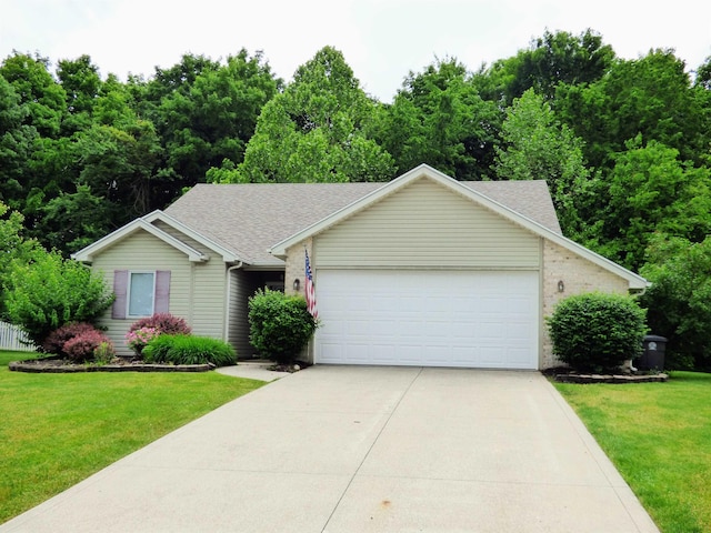 8202 Red Shank Ln, Fort Wayne, IN 46825 - ranch-style house featuring driveway, a garage, a front yard, and roof with shingles