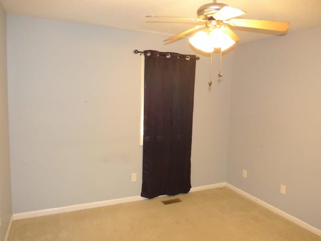 8202 Red Shank Ln, Fort Wayne, IN 46825 - spare room featuring a ceiling fan, carpet, and baseboards