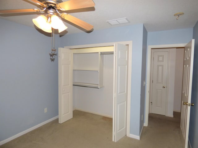 8202 Red Shank Ln, Fort Wayne, IN 46825 - unfurnished bedroom with carpet flooring, a closet, baseboards, and ceiling fan