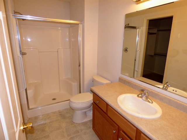 8202 Red Shank Ln, Fort Wayne, IN 46825 - bathroom with a shower stall, vanity, and toilet