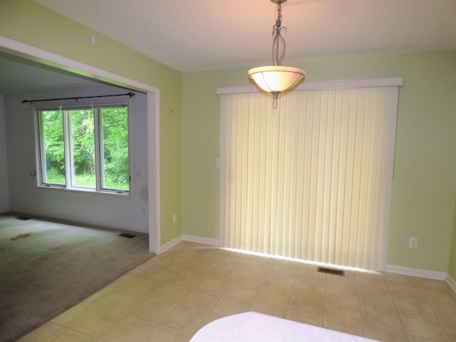 8202 Red Shank Ln, Fort Wayne, IN 46825 - unfurnished dining area with baseboards