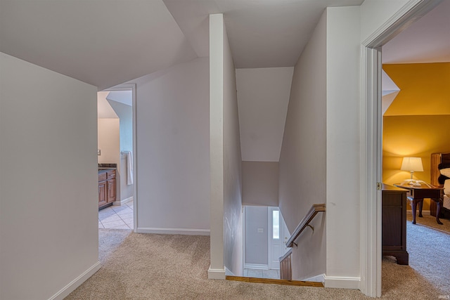 505 Wyndclyff Dr, Evansville, IN 47711 - hallway featuring light colored carpet, an upstairs landing, and baseboards