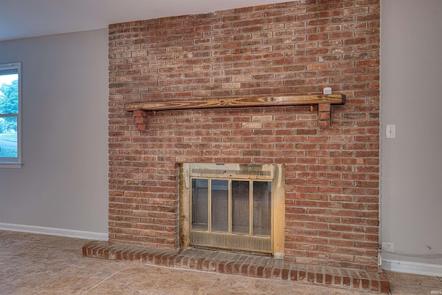505 Wyndclyff Dr, Evansville, IN 47711 - detailed view of baseboards and a fireplace