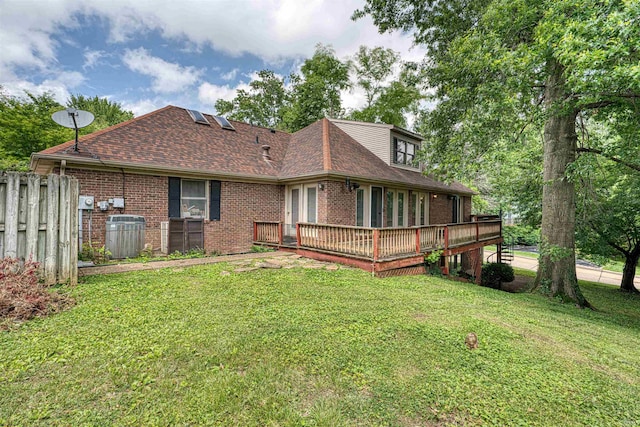 505 Wyndclyff Dr, Evansville, IN 47711 - rear view of property featuring brick siding, a deck, and roof with shingles