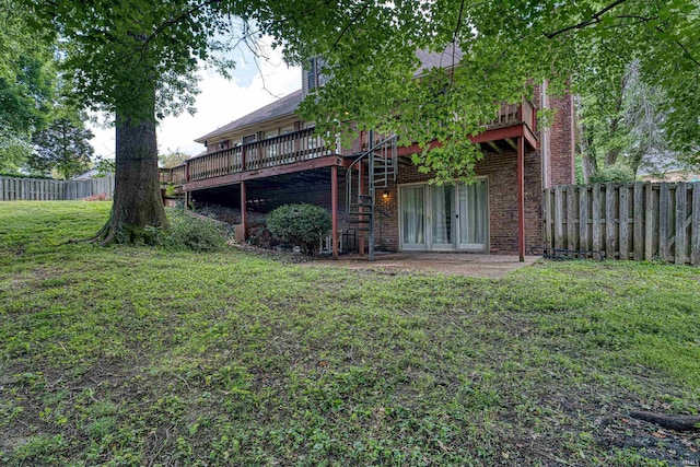505 Wyndclyff Dr, Evansville, IN 47711 - rear view of property featuring a deck and brick siding