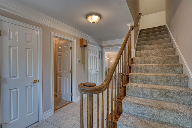 505 Wyndclyff Dr, Evansville, IN 47711 - stairway with baseboards, tile patterned flooring, and crown molding