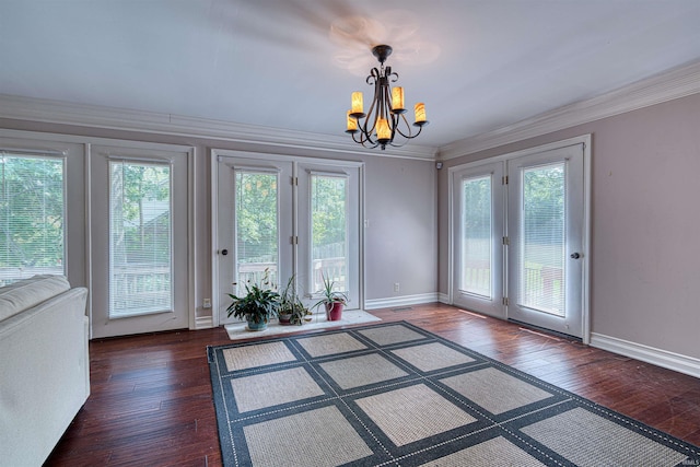 505 Wyndclyff Dr, Evansville, IN 47711 - unfurnished dining area featuring french doors, hardwood / wood-style flooring, a chandelier, healthy amount of natural light, and crown molding