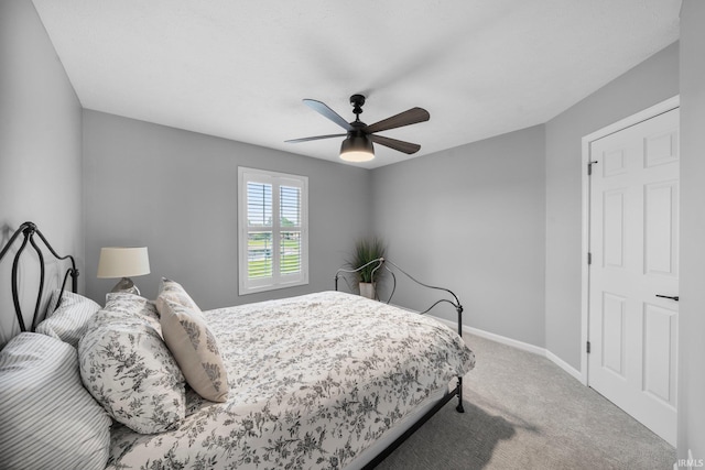 14609 Carrigan Ct, Granger, IN 46530 - bedroom featuring carpet flooring, baseboards, and a ceiling fan