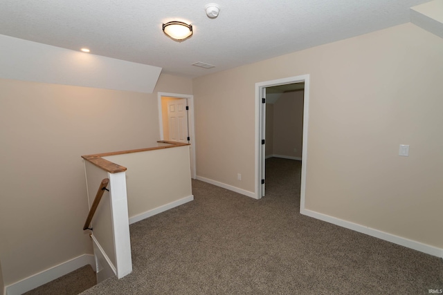 400 E Center St, North Liberty, IN 46554 - carpeted empty room with a smoke detector, baseboards, and a textured ceiling