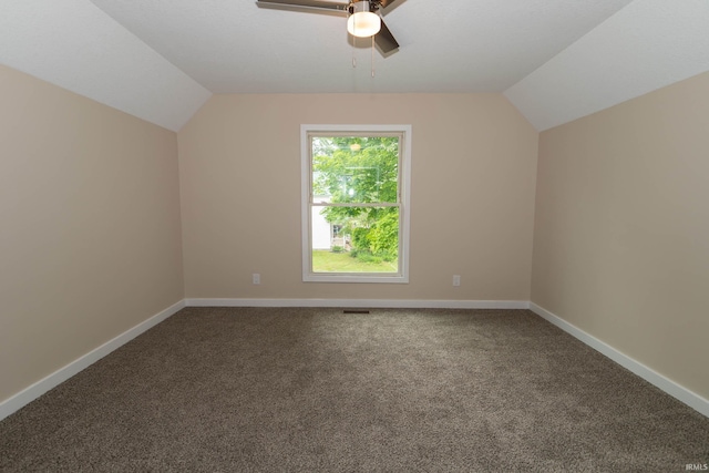 400 E Center St, North Liberty, IN 46554 - additional living space featuring vaulted ceiling, a ceiling fan, carpet floors, and baseboards