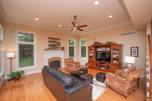 2307 Stacey Hollow Pl, Lafayette, IN 47905 - living area featuring light wood-type flooring, a fireplace, a ceiling fan, baseboards, and recessed lighting