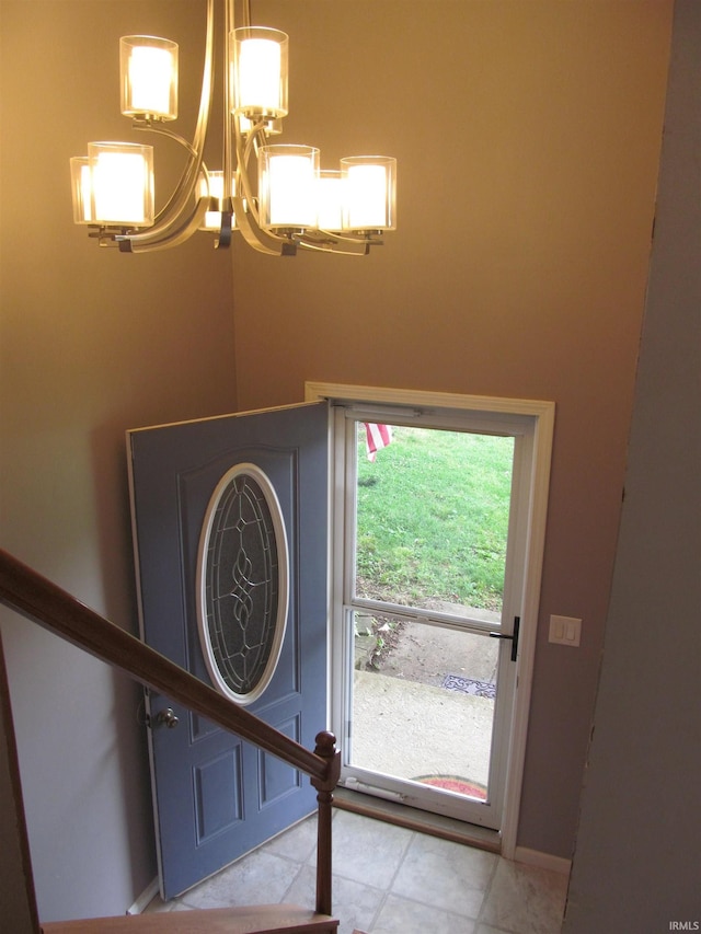 1053 E Smith Cir, Paoli, IN 47454 - entryway with a chandelier, tile patterned flooring, and baseboards