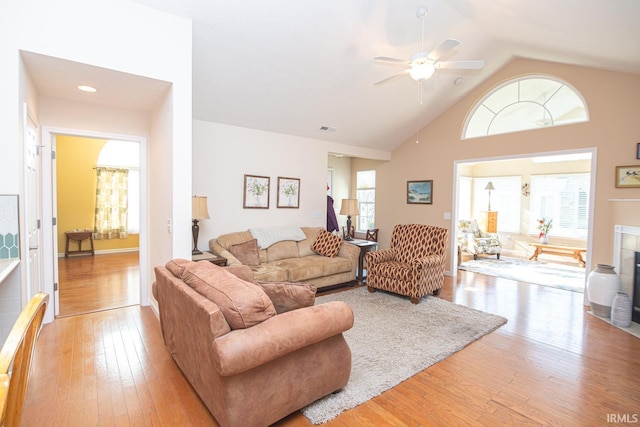 4654 Ironstone Ln, West Lafayette, IN 47906 - living area with light wood finished floors, ceiling fan, and high vaulted ceiling